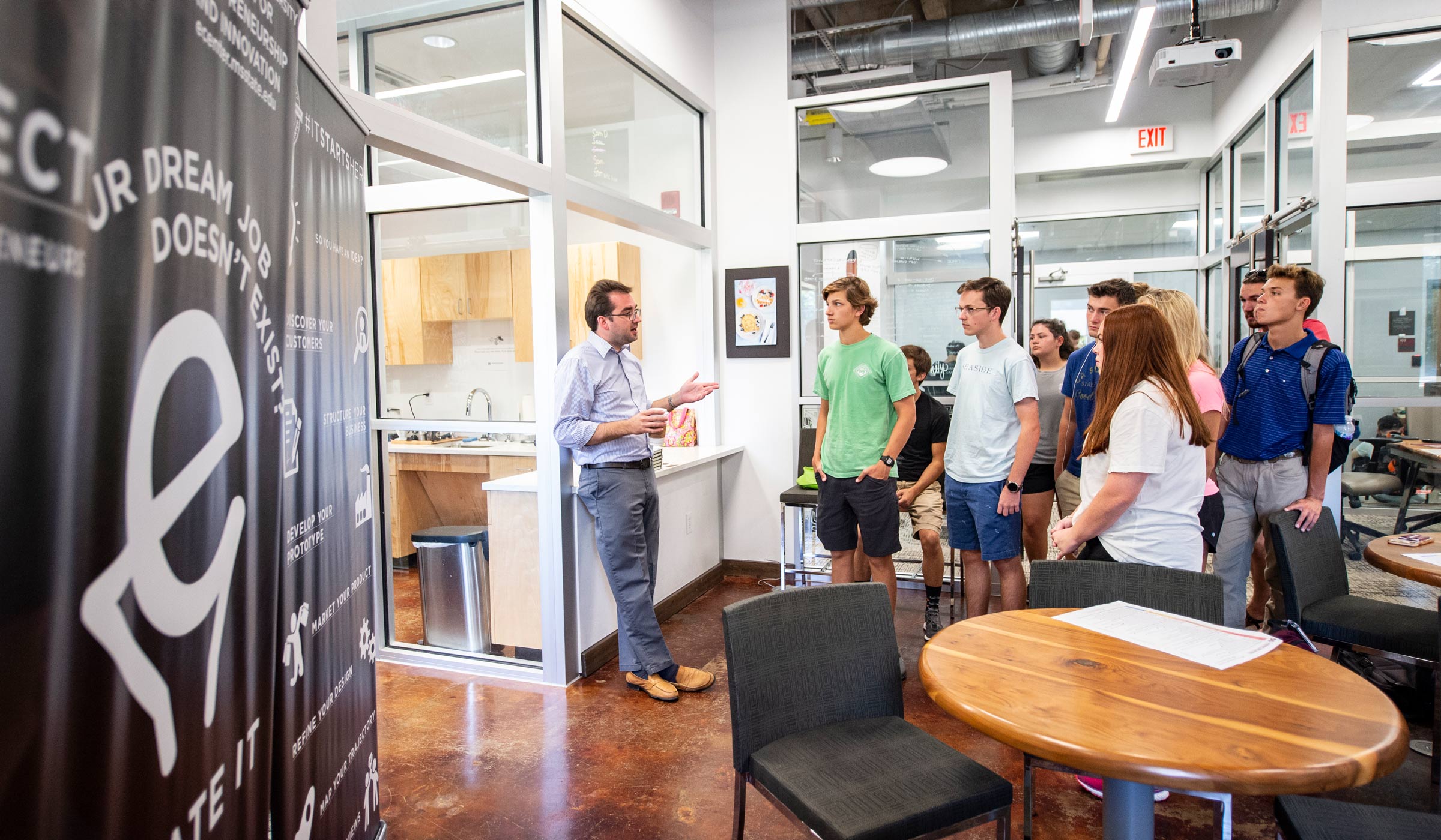 Eric Hill, Director of the E-Center, provides a tour of the E-Center to COB MVP Students.