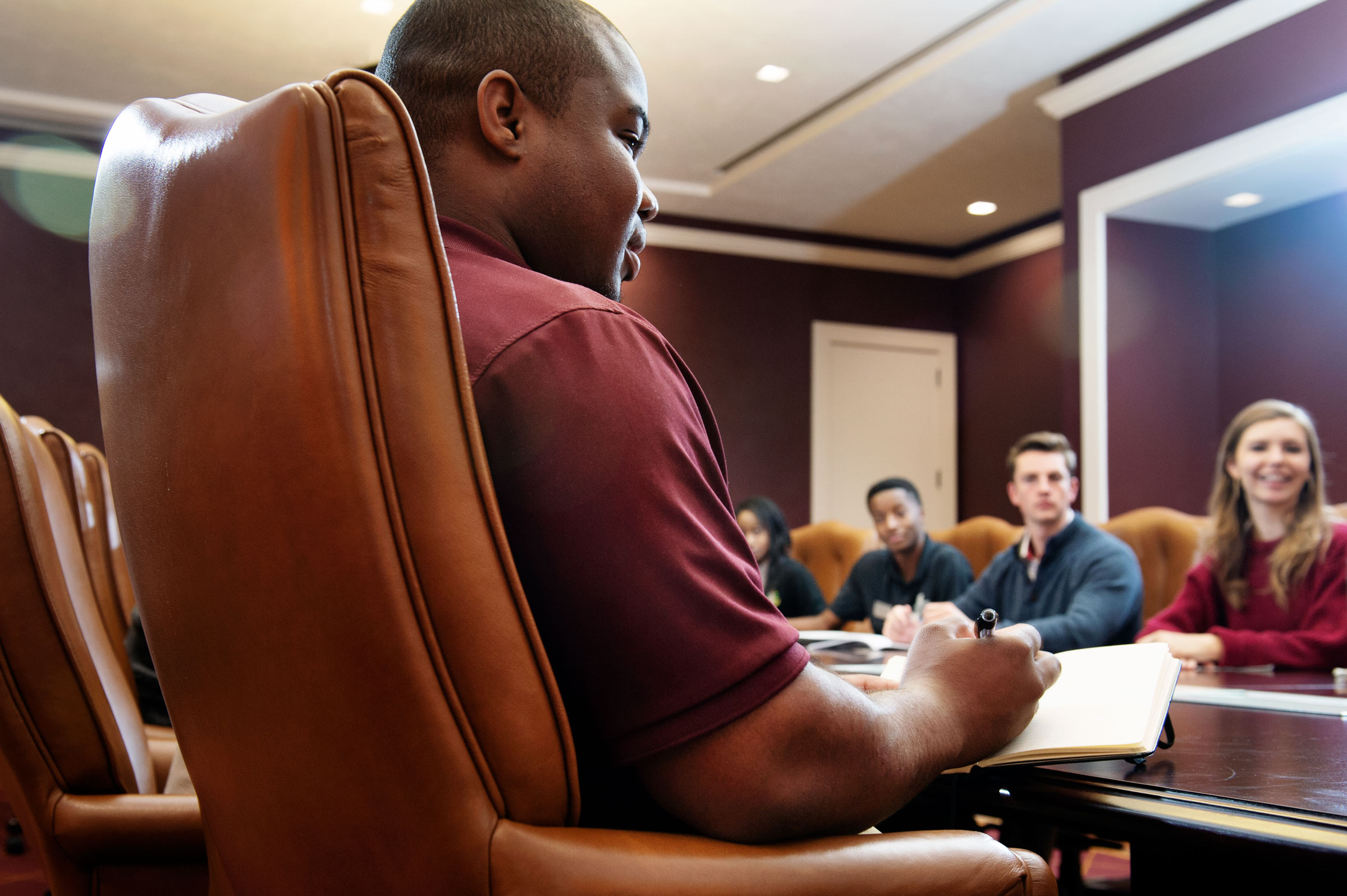 Semaj Martin-Redd takes notes during Honors Leadership Class.