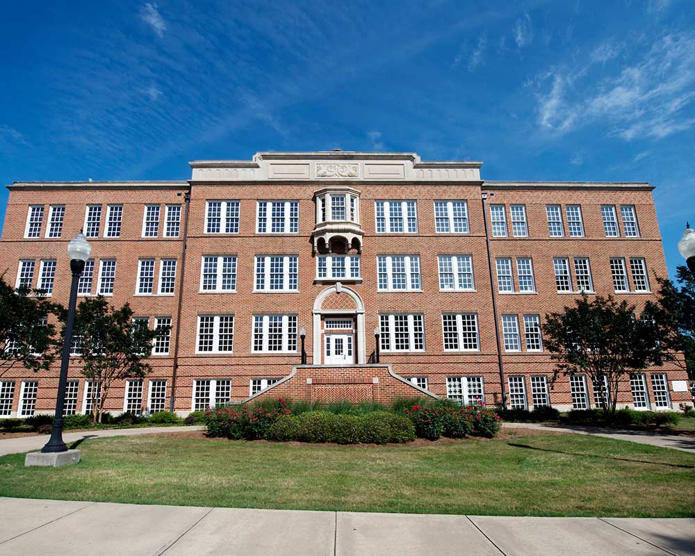 Sidewalk, parking area south of Lloyd-Ricks-Watson Building closes ...