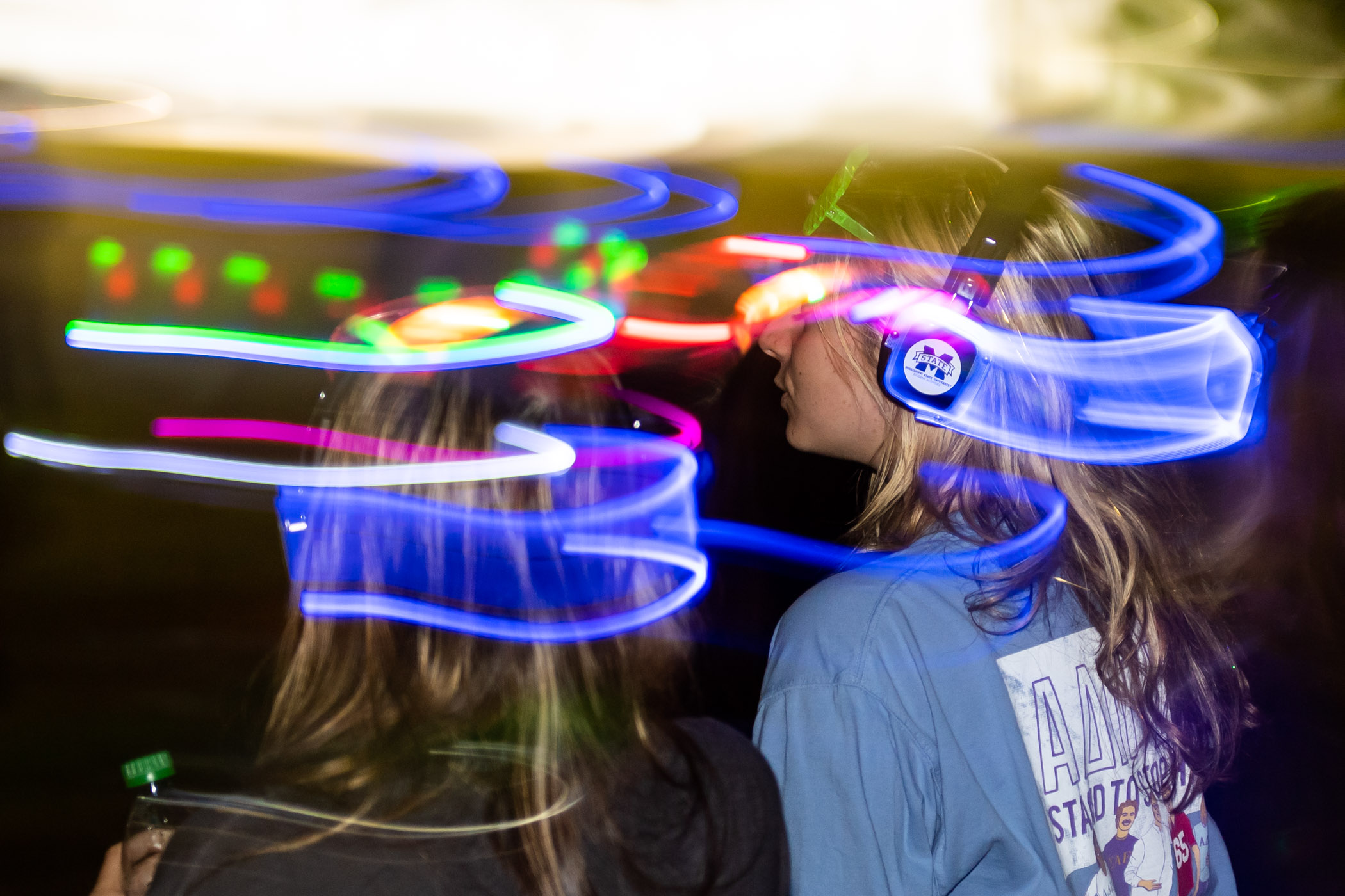 Students enjoy a fun but &quot;silent&quot; night from MSU Student Associations &quot;glow headphone rave.&quot;