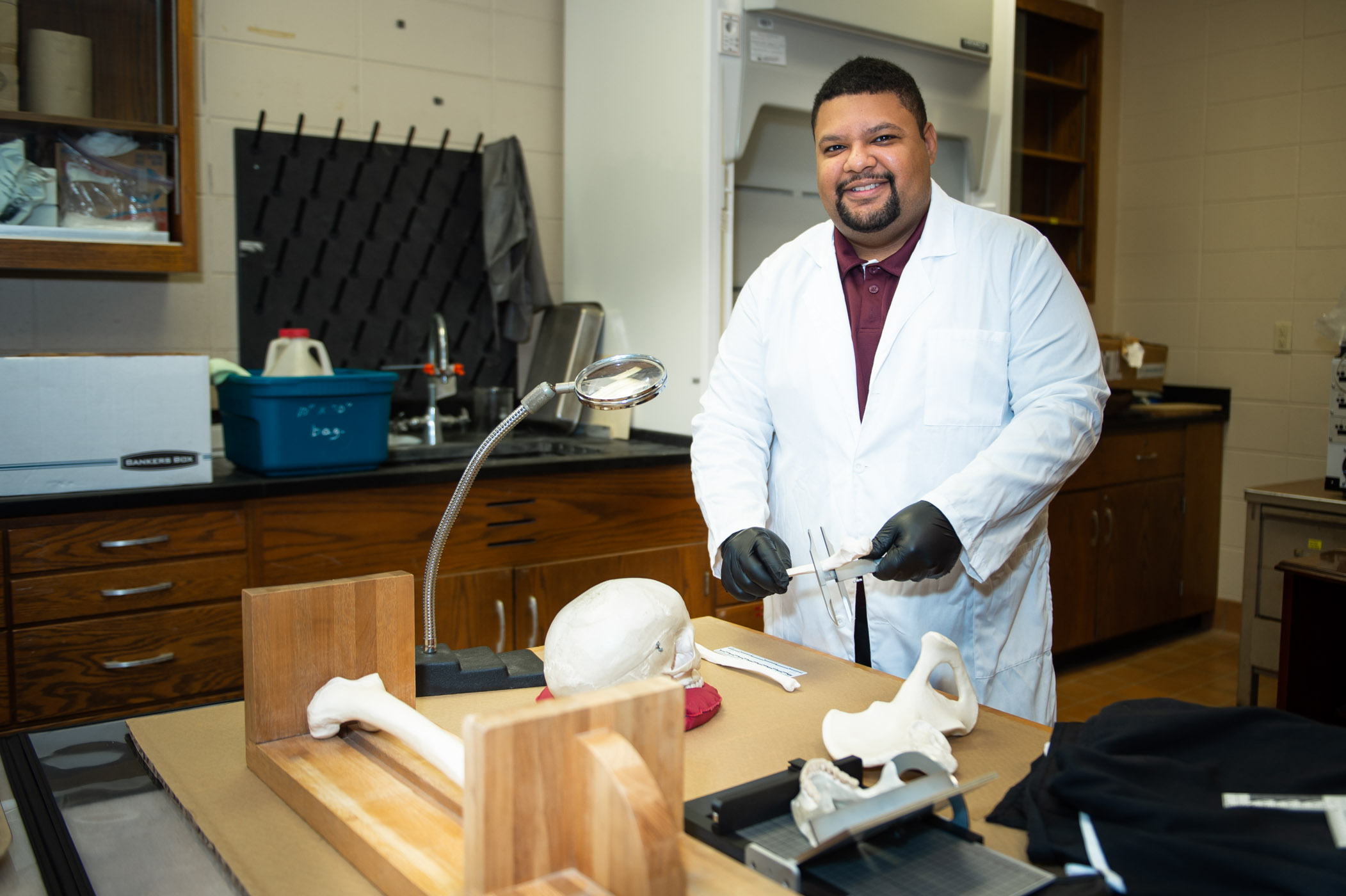 Jesse Goliath, pictured in a lab at MSU&#039;s Department of Anthropology.