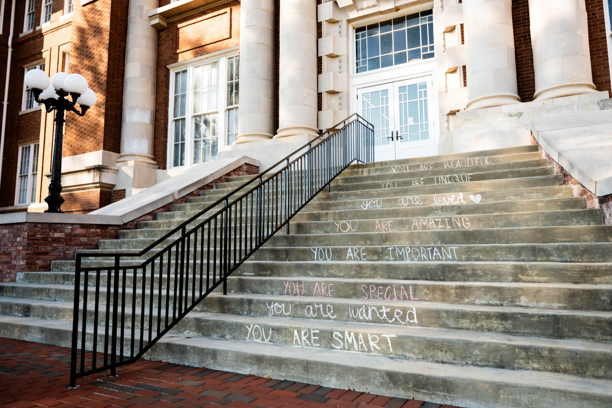 Uplifting phrases written on the steps of MSU&#039;s historic Lee Hall provide a pick-me-up for students passing by. The words of encouragement, created by MSU Delight-- an uplifting student led community for college women, can be found across populated spaces around the Drill Field. 