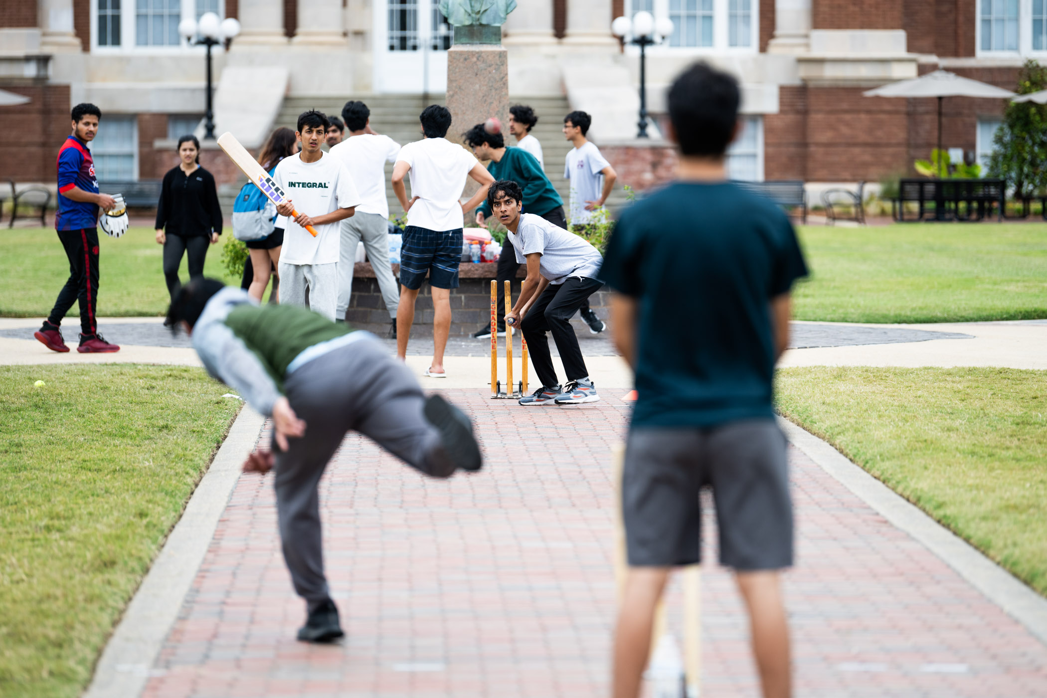 As part of the organization&#039;s &quot;Sports Week,&quot; members of Mississippi State&#039;s Nepalese Student Association (NSA) compete in a friendly game of cricket on the Drill Field.