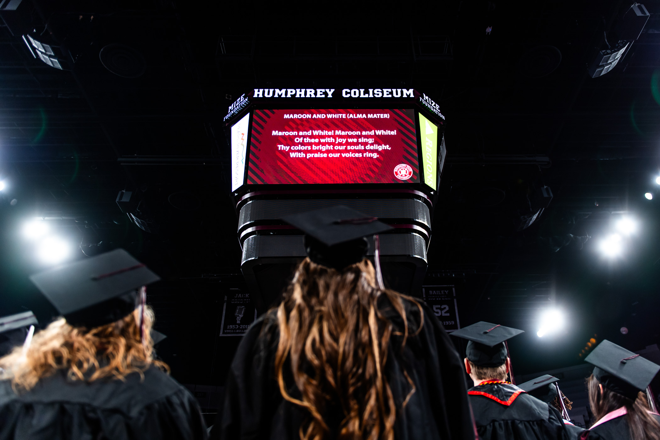Mississippi State&#039;s newest graduates lift their voices inside Humphrey Coliseum to the song of the university&#039;s alma mater, &quot;Maroon and White&quot; at the fall 2023 commencement exercise.