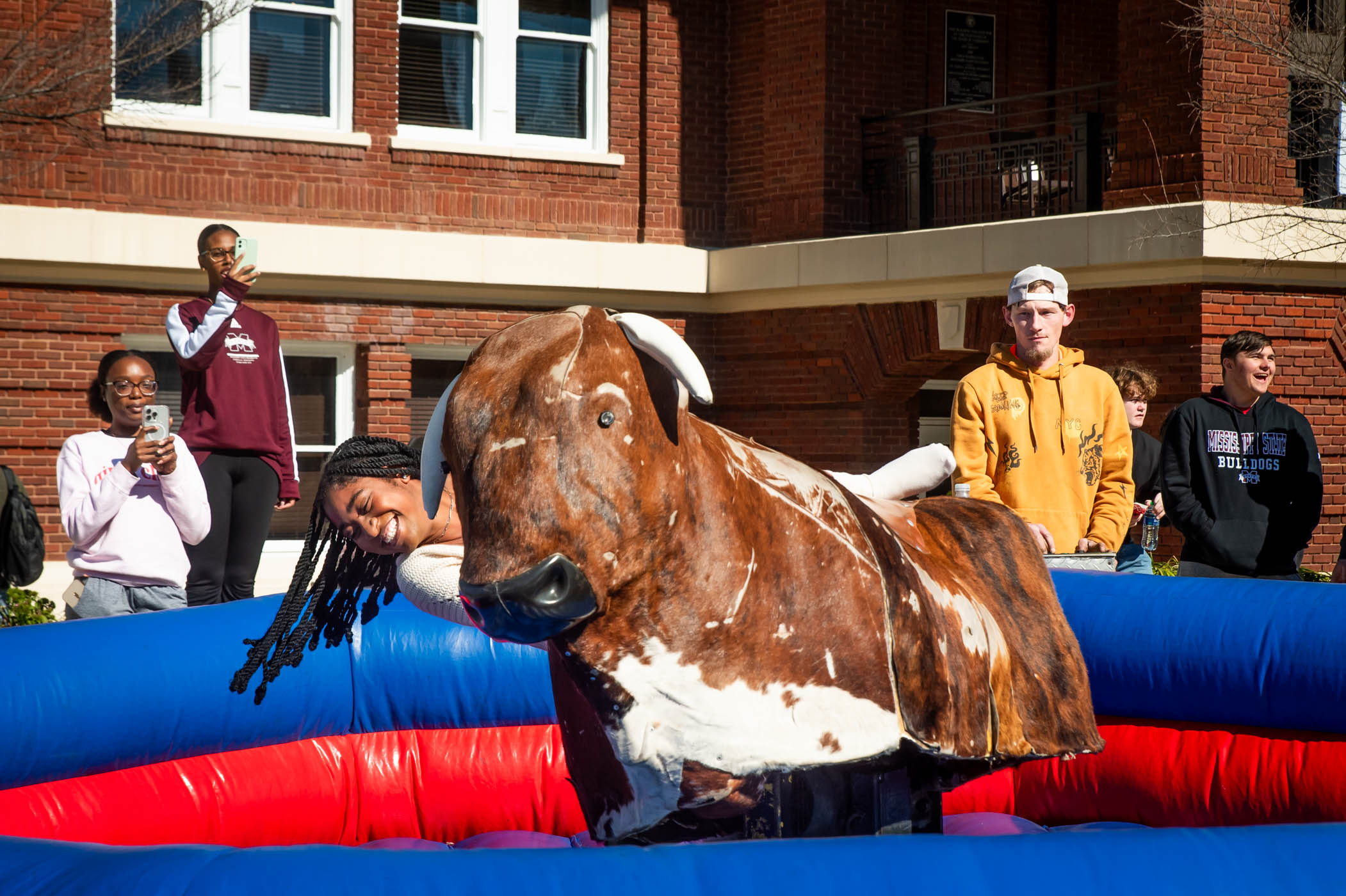 MSU&#039;s Center for Student Activities welcomes eager students to take on the challenge of riding a mechanical bull in the heart of YMCA Plaza. 