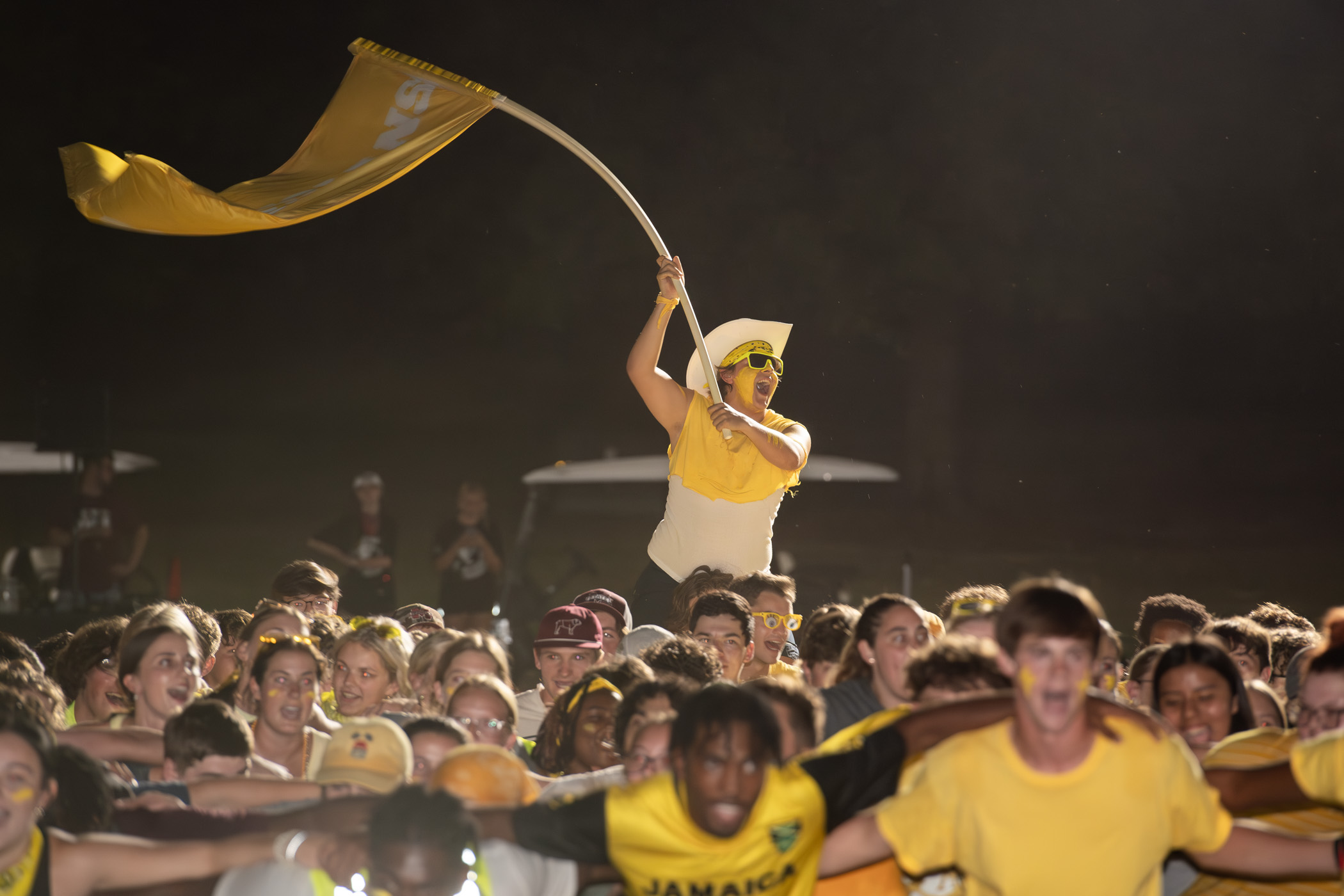 Members of New Maroon Camp&#039;s family group Collegians hype up the crowd during a Maroon Madness competition Tuesday. [Aug. 13].