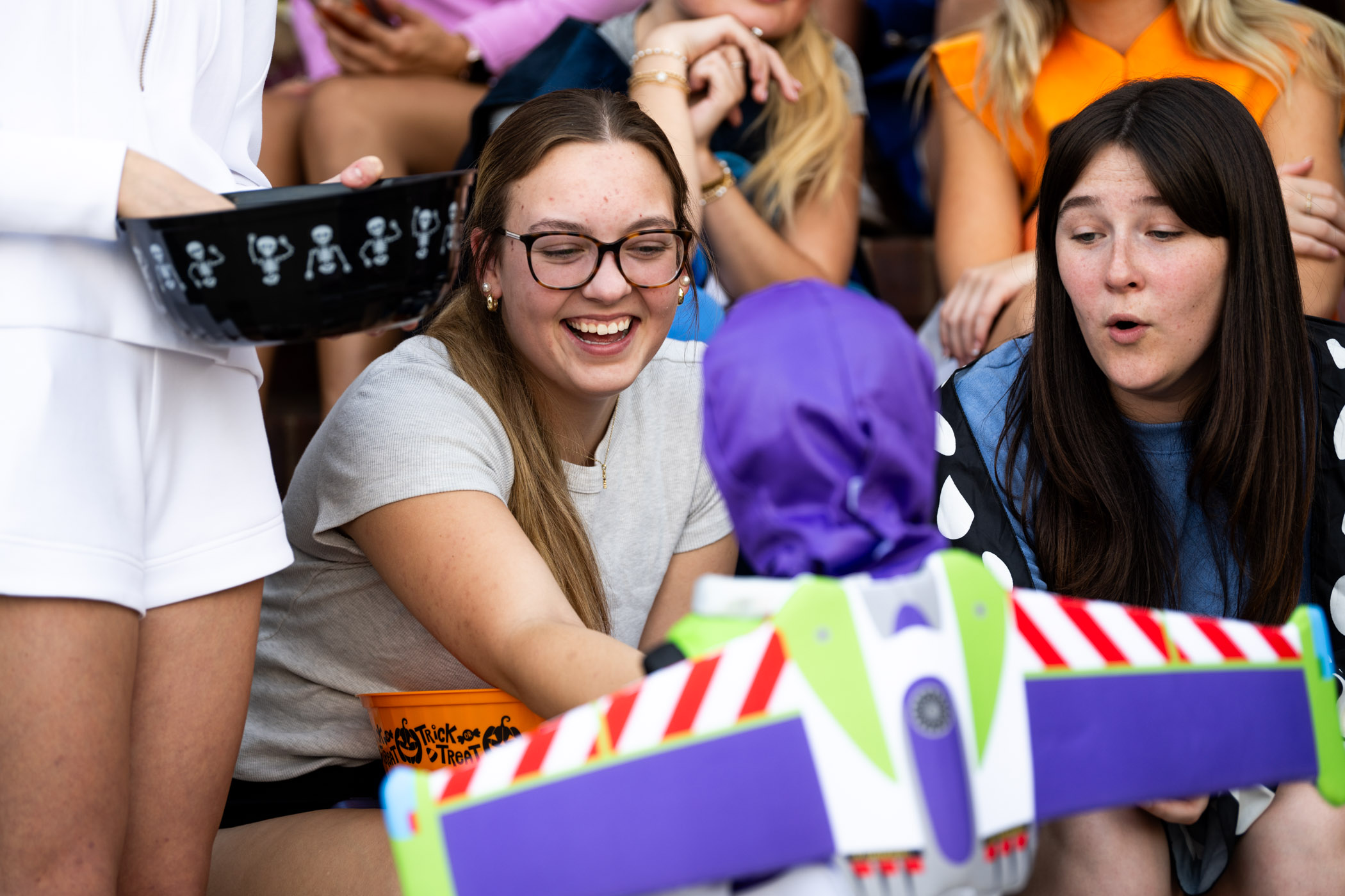 Members of the Delta Delta Delta sorority interact with young trick-or-treaters during MSU&#039;s annual Trick-or-Treat on the Row