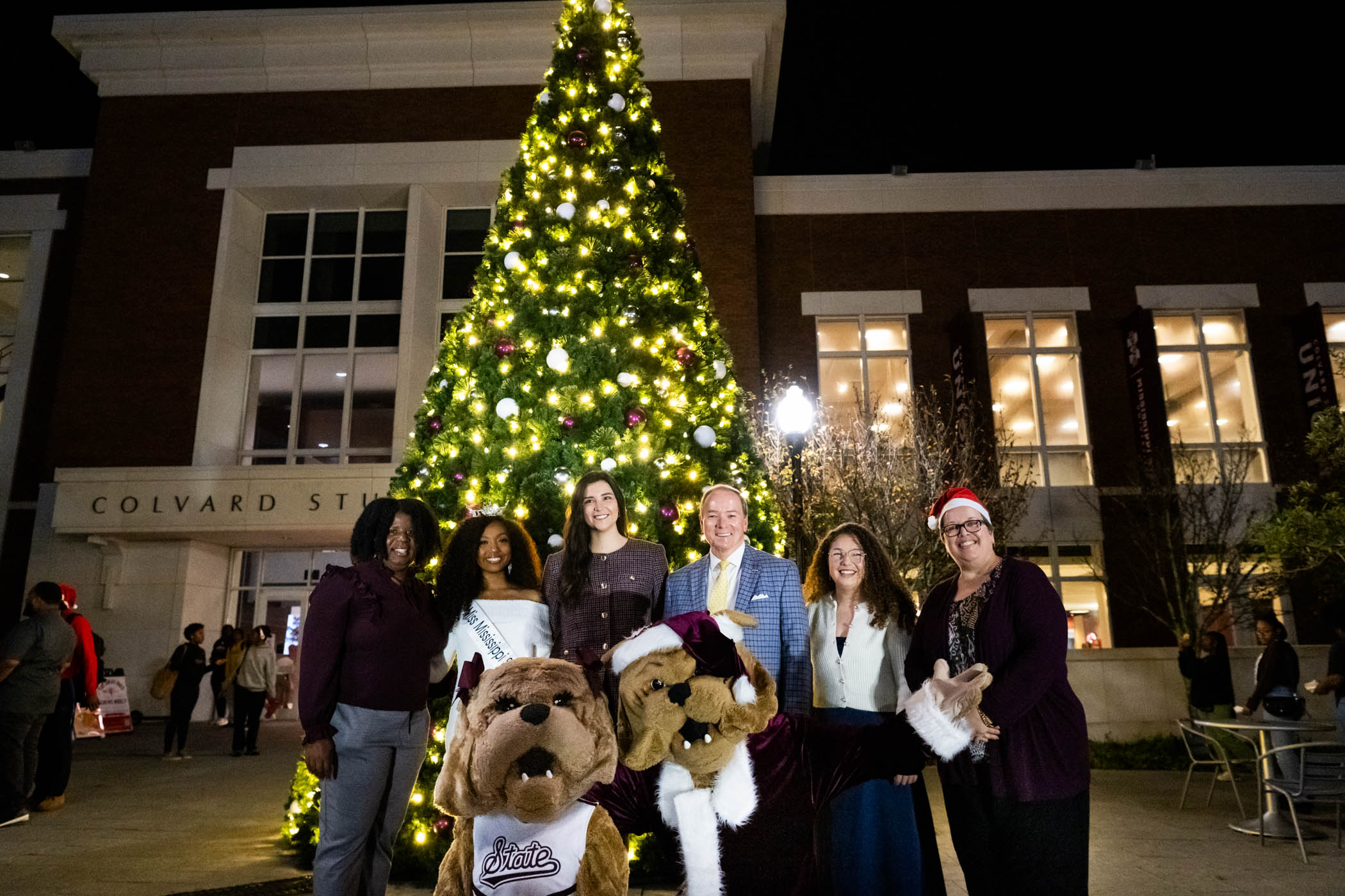 MSU students, staff, and faculty kick-off the holiday season with an annual Christmas tree and menorah lighting. The exciting tradition beings the start of many cozy and community based winter holiday inspired activities happening on campus while making spirits bright.    (Pictured from L to R,) P for Access, Opportunity, and Success- Dr. Ra&#039;sheda Forbes, Miss MSU 2024- Sarah Randolph, Student Association President- Carson McFatridge, MSU President Dr Mark. Keenum, President of MSU Hilell-Gabriella Arbesfel