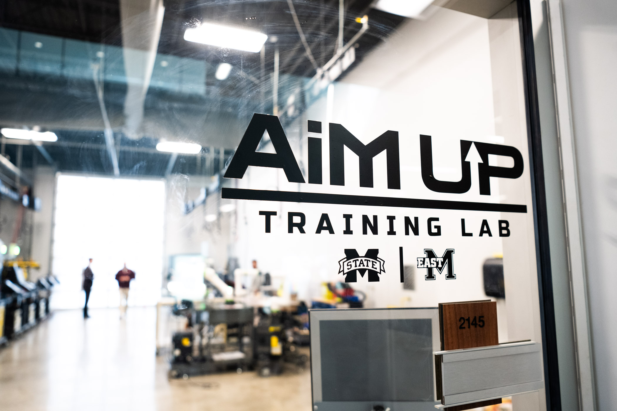 Signage outside the AiM UP lab at EMCC