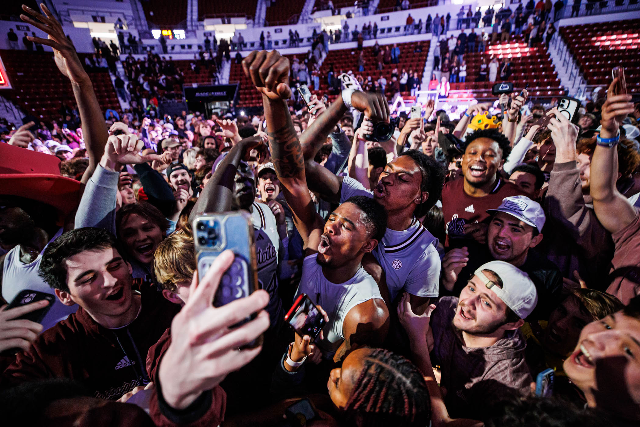 The two Shawns of MSU men’s basketball—guard Shawn Jones, Jr., left center, and forward KeShawn Murphy—posed for a victorious selfie with hundreds of MSU fans Tuesday night [Feb. 18] after the celebratory crowd stormed the court as the No. 21 Bulldogs beat No. 7 Texas A&amp;M. 