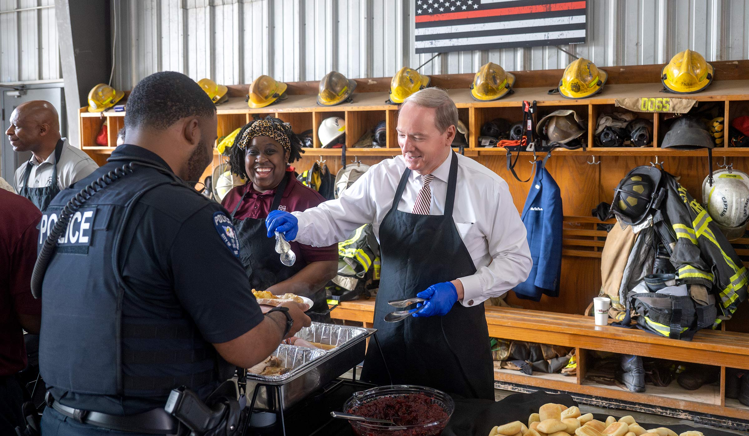 University president serves meal to first responders at the fire station