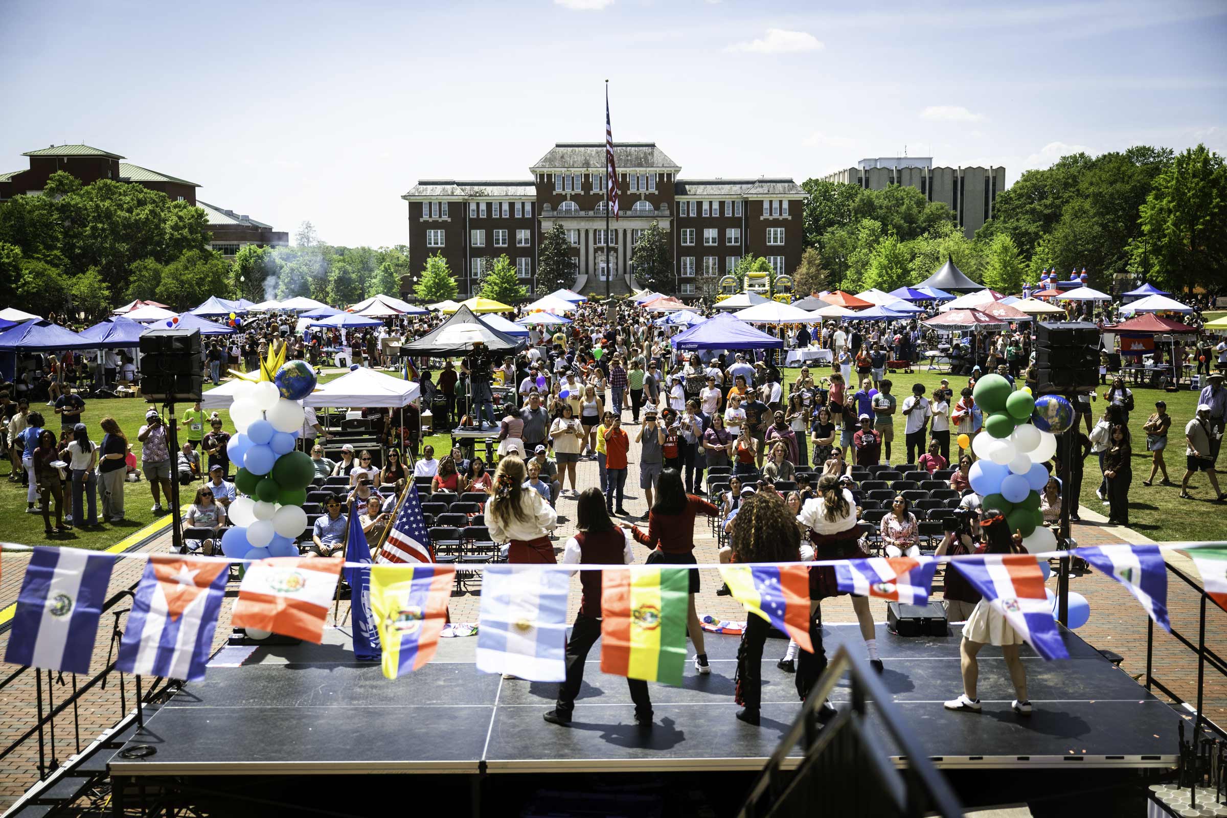 The world gathers on the Drill Field during International Fiesta Saturday, [Apr 11], transforming the heart of campus into a vibrant crossroads of cultures.