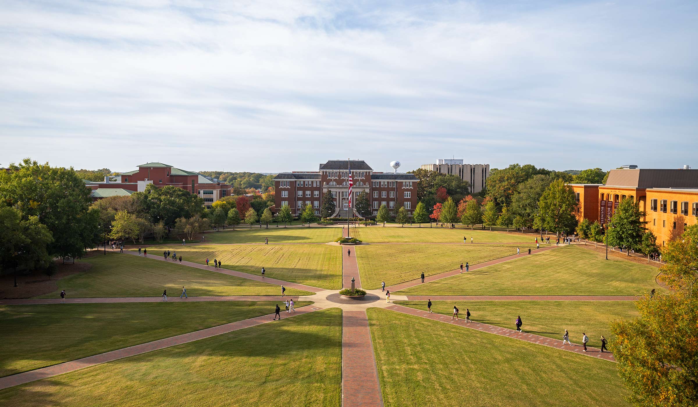 A view of the Drill Field from above displays pops of colorful trees.