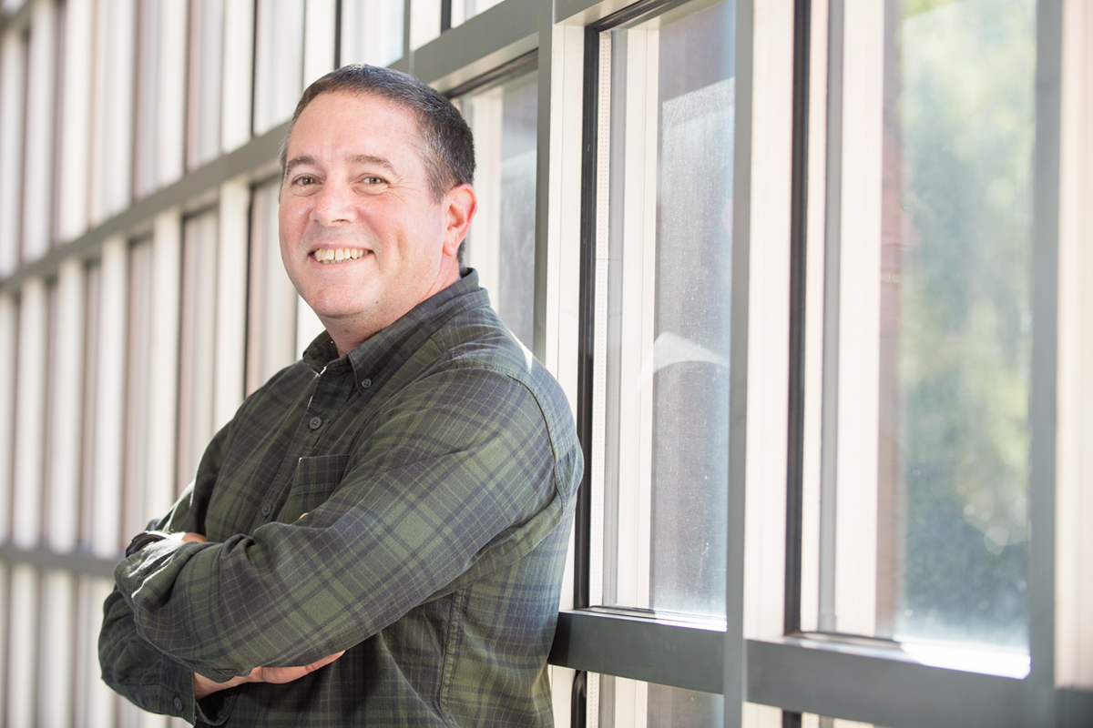 John McGinley, pictured in front of windows at CAVS.