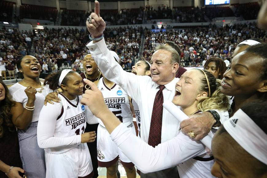 Women&amp;#039;s Basketball coach and team celebrating advancing to the Sweet 16 of NCAA Tournament