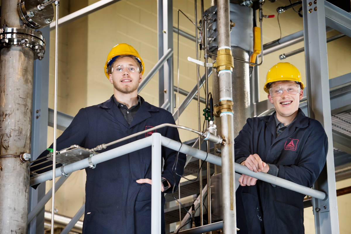 Tyler and Davis Bentinck-Smith, pictured wearing hardhats in a lab setting.