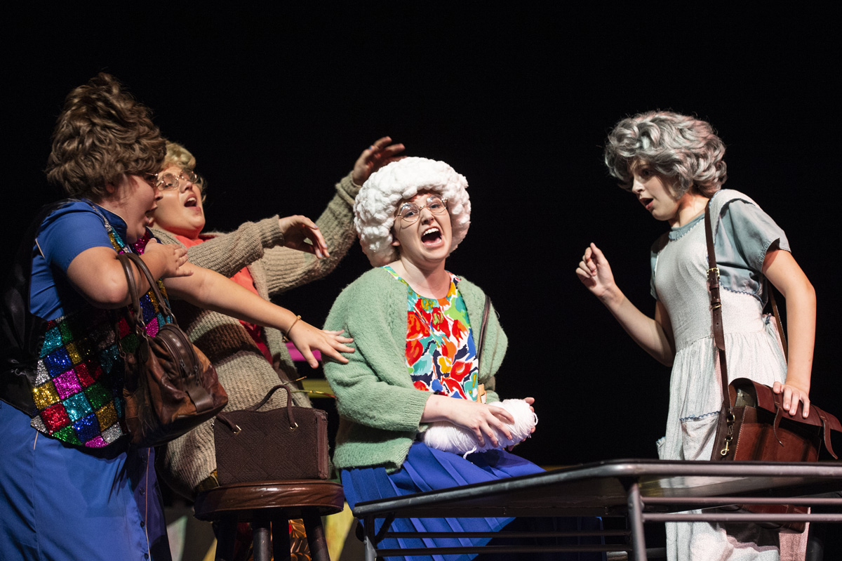 Summer Scholar campers act on stage during their dress rehearsal of a three act musical Multiverse Mayhem at McComas Hall.