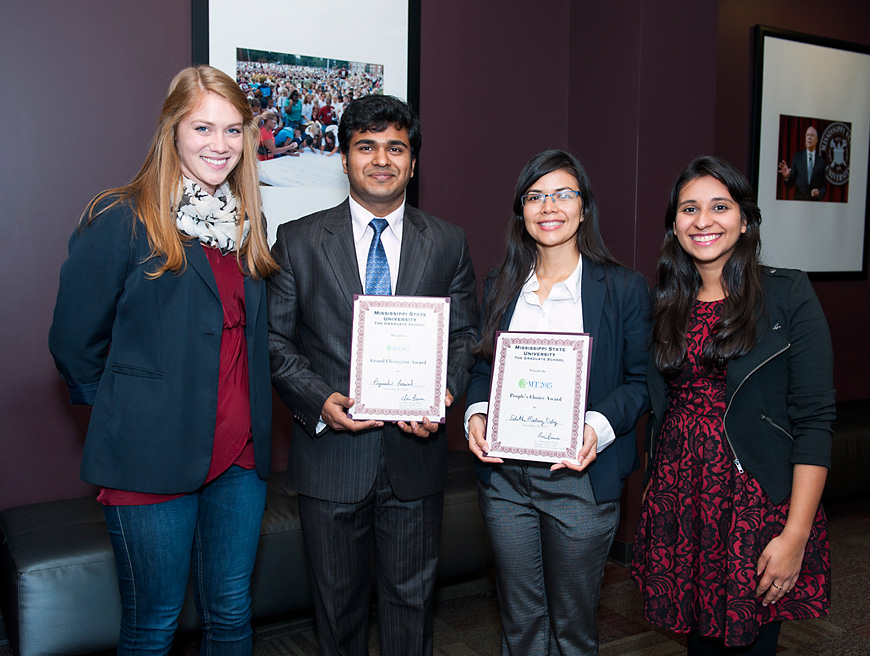 Award winners at MSU’s third annual Three Minute Thesis competition included, from left, Abbey E. Wilson, a master’s student in agricultural and life sciences, Grand Champion Runner Up (tie); Piyush Porwal, a master’s student in mechanical engineering, Grand Champion; Edith L. Martinez Ortiz, a doctoral student in civil engineering, People’s Choice Award; and Dafne Alves Oliveira, a doctoral student in molecular biology, Grand Champion Runner Up (tie). (Photo by Russ Houston)