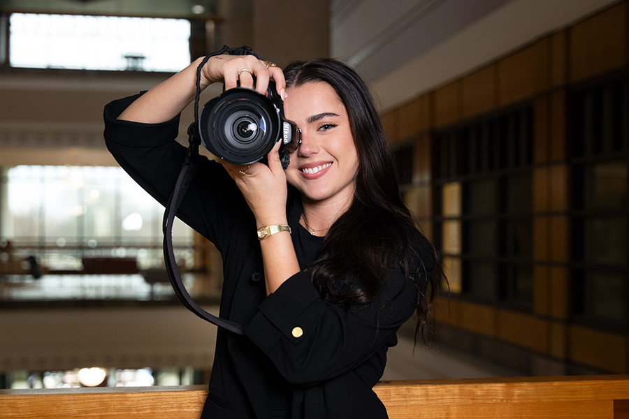 woman holding a camera