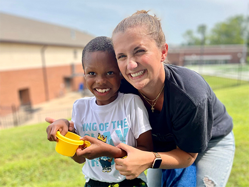 Brooke Paben, a second-year MSU Applied Behavior Analysis graduate student from Madison, gains hands-on experience working with a child at the MSU Autism and Developmental Disabilities Clinic in Starkville. 