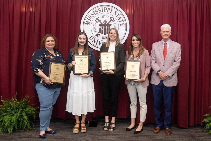 Advising award recipients (l-r) Lori Elmore-Staton, Haylee Crouch, Kristine Evans, and Kali Dunlap are pictured with Executive Vice Provost Peter Ryan. (Photo by Beth Wynn)