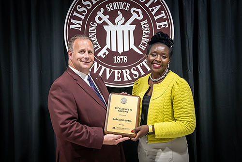 CALS Dean and MAFES Director Scott Willard and Associate Professor Caroline Kobia, School of Human Sciences, winner of the CALS Excellence in Advising Award. (Photo by David Ammon)
