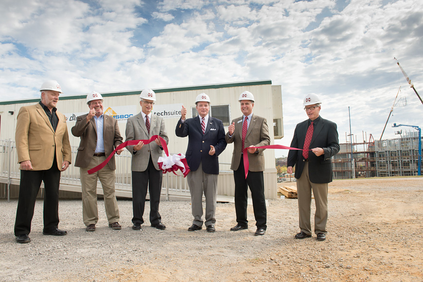 Among those participating Friday [Oct. 23] in a ribbon cutting ceremony for the Mississippi State University building construction science program’s new Construction Training and Research Laboratory were (l-r) Ron Perkins, president of Jobsite Tech Group; Craig D. Capano, Roy Anderson Endowed Professor and BCS program director; MSU Provost and Executive Vice President Jerry Gilbert; MSU President Mark E. Keenum; MSU industrial arts education alumnus Joel A. “Tony” Carroll of Tupelo, vice president and construction manager of Sanderson Construction Co. Inc.; and Jim West, dean of MSU’s College of Architecture, Art and Design. (Photo by Megan Bean)