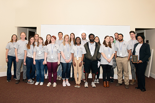 Participants in Mississippi State’s 11th annual Biological Sciences Undergraduate Research Program symposium pose with faculty members and keynote speaker Veronica Scott, far right, after Friday’s [April 6] award ceremony. (Photo by Beth Wynn) 