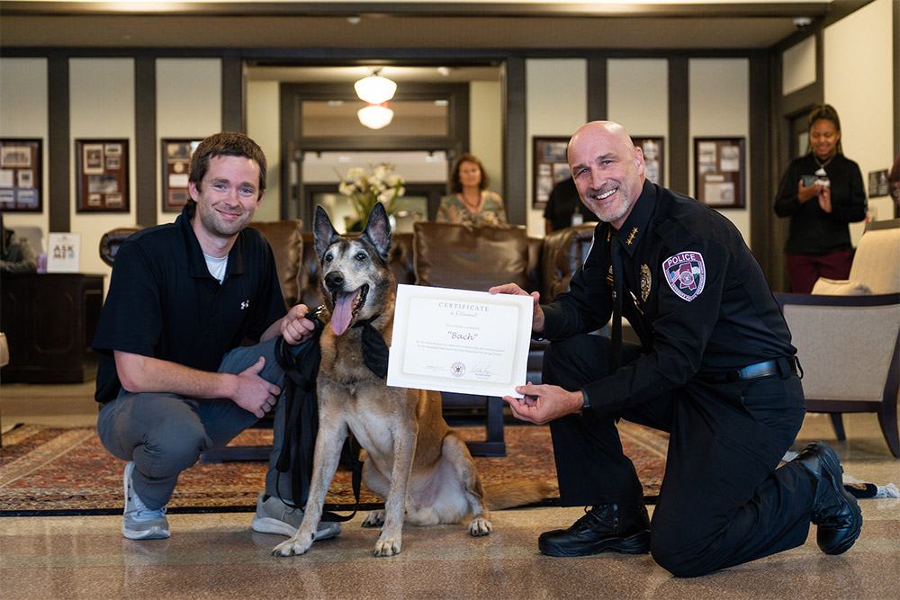 Pictured (left to right) are former MSUPD Sergeant Wesley Bunch, K-9 Bach and MSU Assistant Police Chief Brian Locke. 