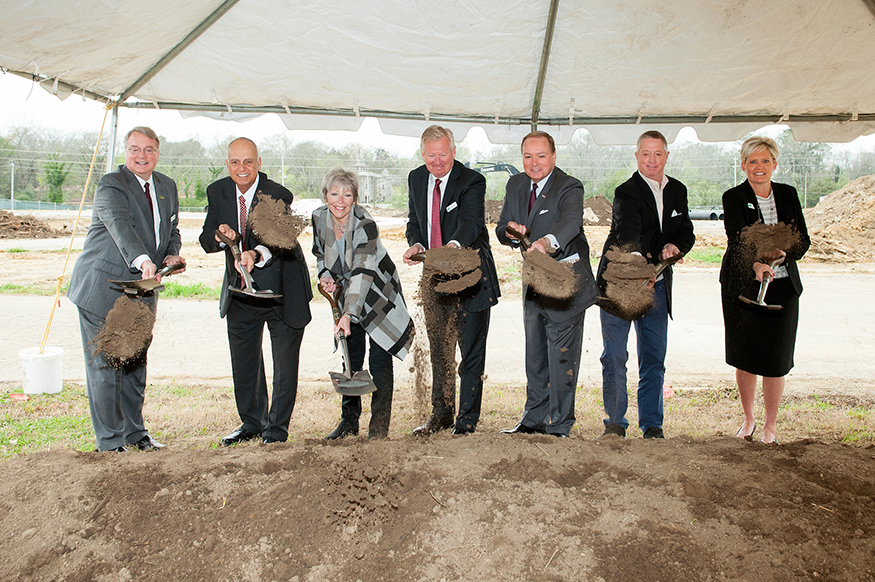 Officials from EdR, the city of Starkville and Mississippi State University formally break ground on the College View development, a $67-million student housing project that includes retail and commercial space. Pictured, from left, are EdR Vice President of Real Estate Development Mark Grambergs, EdR President Tom Trubiana, Starkville Mayor Lynn Spruill, EdR CEO Randy Churchey, MSU President Mark E. Keenum, Mississippi Institutions of Higher Learning Board of Trustees Member John W. Starr and EdR Executive Vice President and Chief Operating Officer Chris Richards. (Photo by Russ Houston)