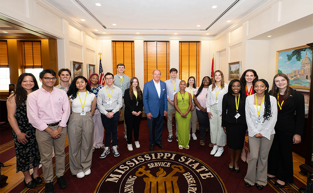 Delta Scholars are pictured with Mississippi State University President Mark E. Keenum 