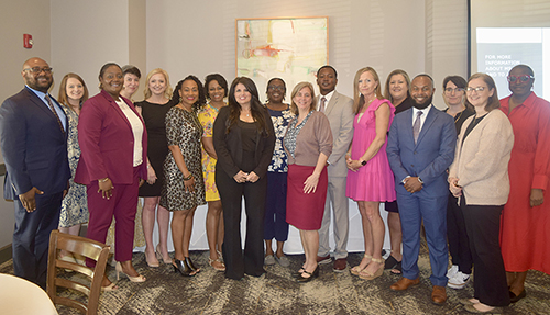 Graduates of the Mississippi State Social Science Research Center’s Mississippi Education Policy Fellowship Program pose with program coordinators.