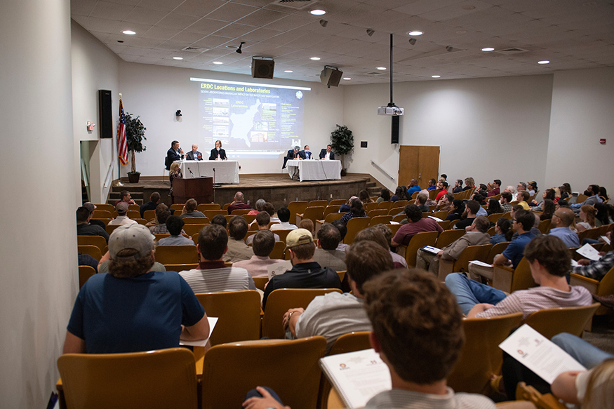 A full auditorium watches an MSU and ERDC Panel Discussion