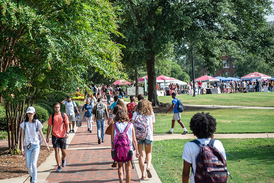 Students walking to class on the MSU Drill Field