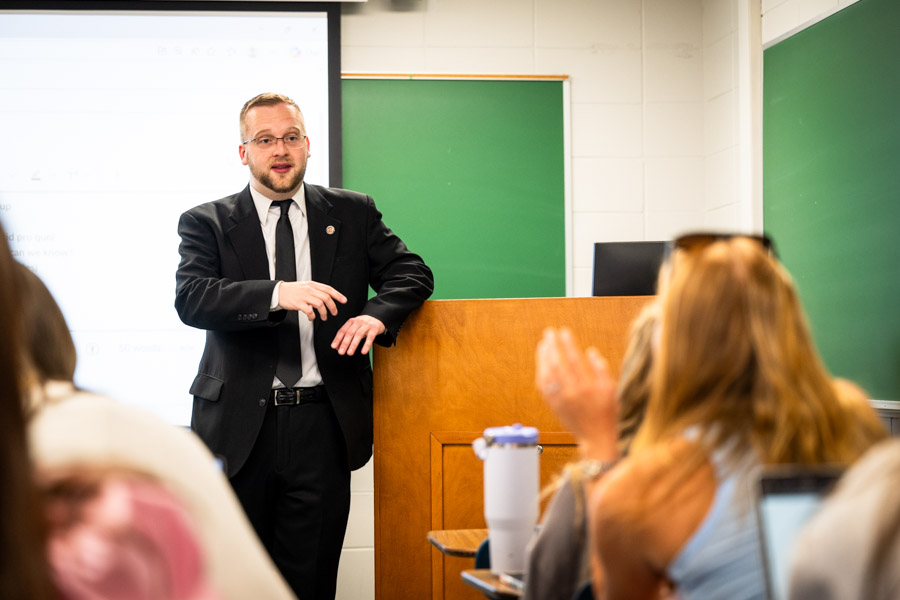 gil carter teaching a course to students
