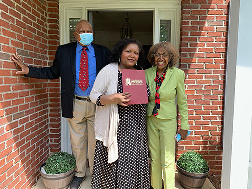 Donna Michelle Smith, center, with her parents, Don and Ann Smith