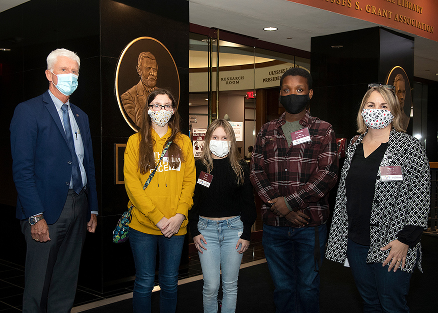 Pictured standing in front of MSU's Ulysses S. Grant Presidential Library are Peter Ryan, MSU associate provost for academic affairs and dean of the Graduate School; Oak Hill Academy students Kyla Stroud, Anna Henson and Jeremiah Carter; and Oak Hill Academy librarian Sherry Freeman.