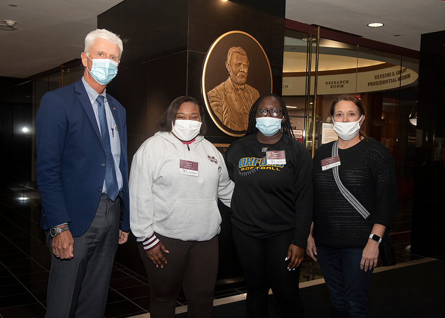 Pictured standing in front of MSU's Ulysses S. Grant Presidential Library are Peter Ryan, MSU associate provost for academic affairs and dean of the Graduate School; Oxford High School students Kalvia Caldwell and Kirsten Booker; and Oxford High School librarian Amanda Osborne.