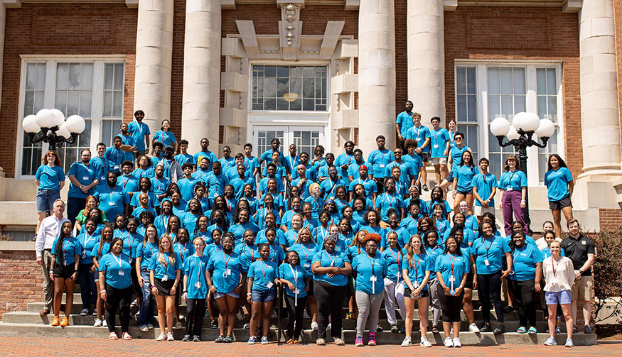 Participants and teachers of the Summer STEM Preparatory Program at Mississippi State are pictured on the steps at Lee Hall
