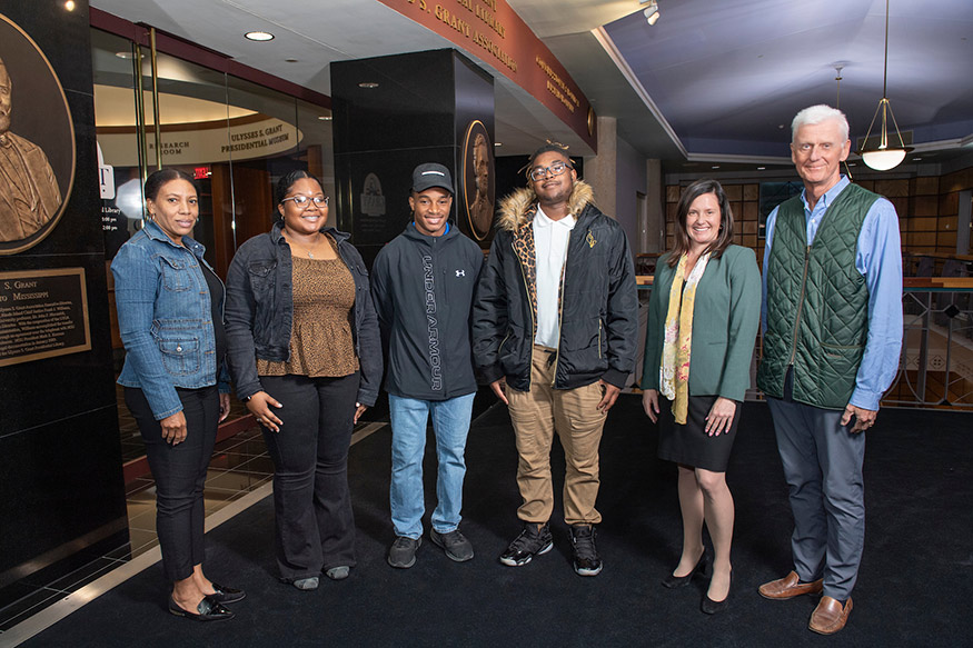 Pictured left to right: Holly Springs High School Librarian Barbara Humphrey; HSHS students Amari Jefferson, Brandon Lester and Martavious Mays; MSU Professor and Dean of Libraries Lis Pankl; and Executive Vice Provost and Dean of the Graduate School Peter Ryan. 