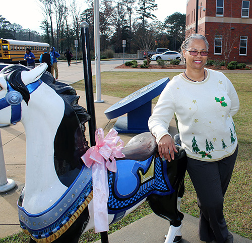 Minnie Powe, 56, a teacher assistant in special education at Meridian High School, participated in the Thursday [Dec. 7] commencement ceremony at Mississippi State University-Meridian. A native of Kemper County, Powe is one of 24 MSU students receiving college degrees through the Complete 2 Compete statewide initiative. (Photo by Lisa Sollie)