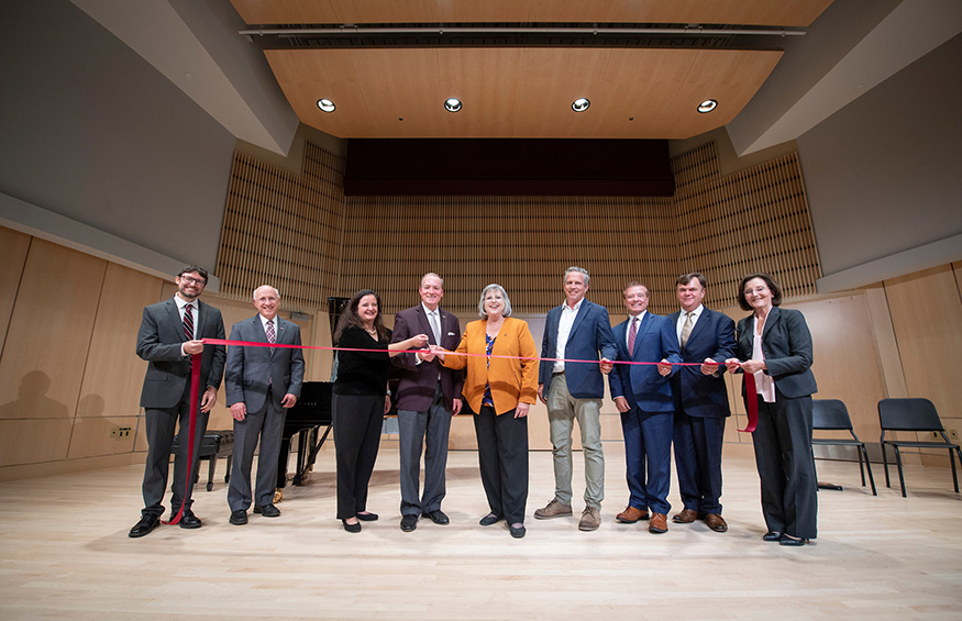Officially cutting the ribbon to celebrate the opening of Mississippi State’s new Music Building are, left to right, Department of Music Head Daniel Stevens; Provost and Executive Vice President David Shaw; Professor of Music and Steinway Artist Rose Sebba; MSU President Mark E. Keenum; Director of Bands Elva Kaye Lance; Hoppy Allred with Allred Stolarski Architects; Mississippi Board of Trustees of State Institutions of Higher Learning President Thomas Duff; Hal McMahon of Mac’s Construction Company, Inc.; College of Education Dean Teresa Jayroe. 
