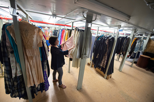 Mississippi State Communication Instructor Melanie Harris looks at a polka-dotted skirt that is part of the Myrna Colley-Lee Costume Collection housed at the university’s Mitchell Memorial Library. In addition to actual pieces dating from the 1920s to the present, the collection consists of vintage costumes and clothing amassed by Colley-Lee throughout her 40-year professional career as a costume designer. (Photo by Megan Bean)