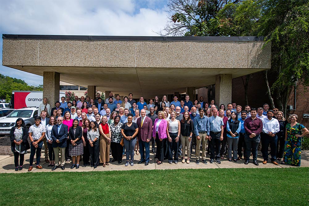 MSU President Mark E. Keenum with a large group of new faculty members