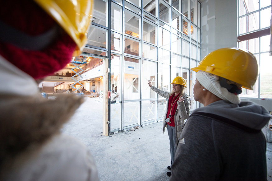 Teachers take a tour of the under-construction Partnership School at Mississippi State.