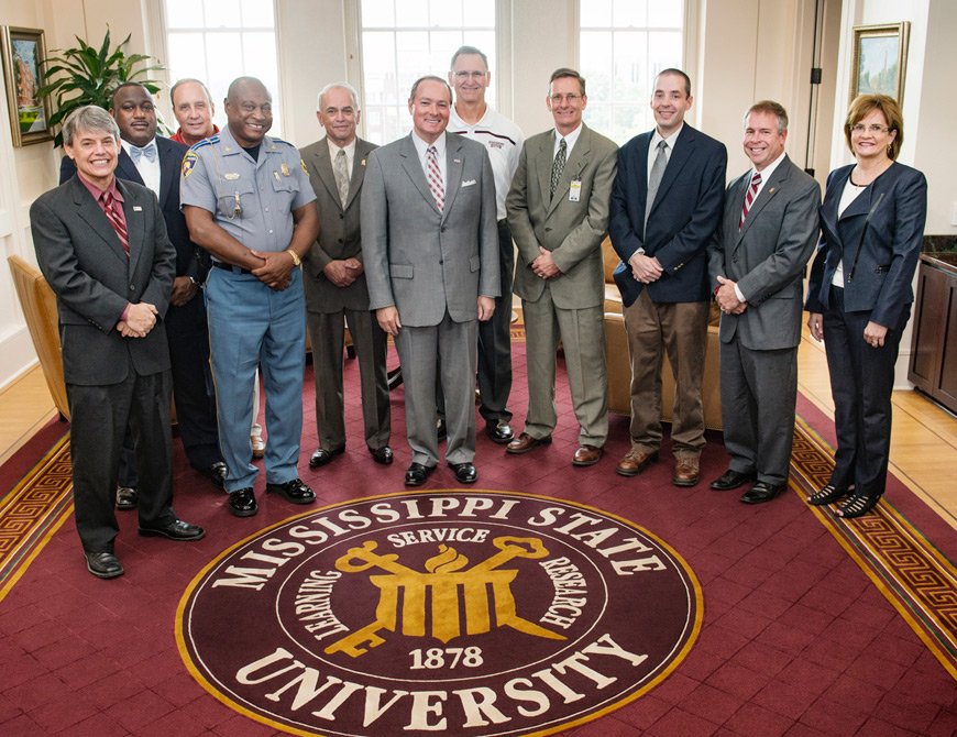 Craig Carter of the Mississippi Department of Transportation; Chief Frank Nichols of the Starkville Police Department; Oktibbeha County Sheriff Steve Gladney; Mississippi Highway Patrol Director Col. Donnell Berry; Mississippi Public Safety Commissioner Albert E. Santa Cruz; MSU President Mark E. Keenum; MSU Executive Associate Athletic Director Duncan McKenzie, MSU Police Chief Vance Rice; MSUPD Lt. Brad Massey; Mississippi  Department of Public Safety Deputy Administrator Ken Magee; and MSU Vice President for Campus Operations Amy Tuck.