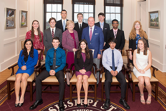 MSU Provost and Executive Vice President Judy Bonner (middle row, third from left) and President Mark E. Keenum (middle row, fourth from left) welcome the newest class of Mississippi State University Provost Scholars. From left to right, they include (front row) Shanika Musser, Christopher Clements, Georgiana Swan, Chuyen Nguyen, Mary Lee; (second row) Hannah Scheaffer, James Warren, Bonner, Keenum, Chirantan Sen Mukherjee, Abigail Crouse; (third row) Mitchell Harvey, Brady Kruse and Colton Watson. (Photo by Beth Wynn)