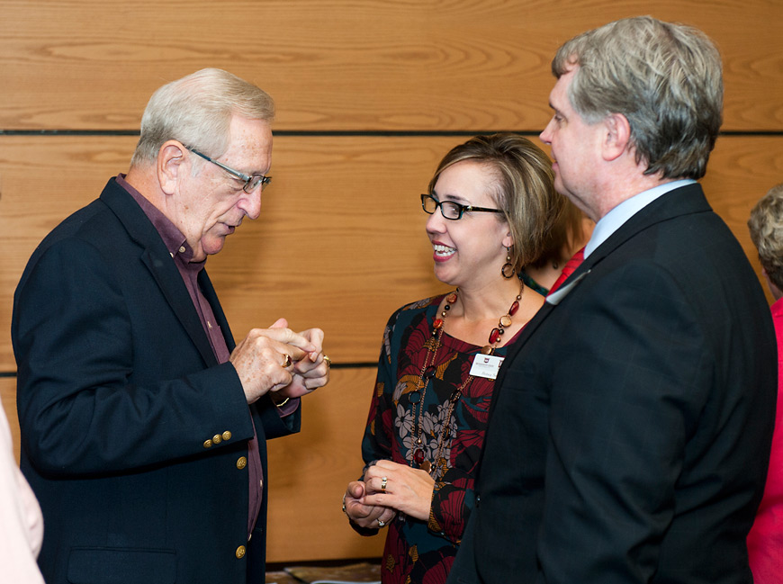 Bruce Stirewalt, left, a former director of MSU’s Research and Curriculum Unit, talks with RCU Associate Director Betsey Smith and Mike Mulvihill with the Mississippi Department of Education’s Bureau of Career and Technical Education. The RCU is celebrating 50 years of service at Mississippi State. (Photo by Russ Houston)