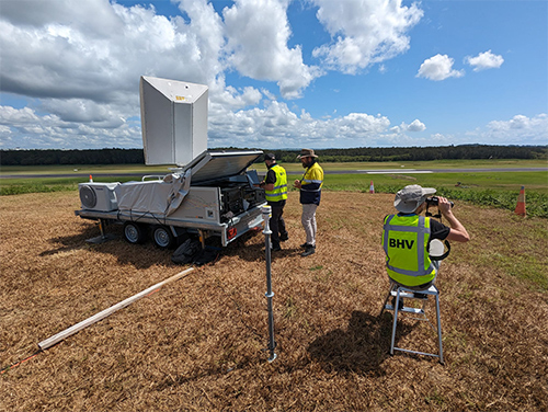 The field team conducts bird observations for the deployment and testing of the MAX(R) radar at the Ballina-Byron Gateway Airport in New South Wales, Australia. From left to right, Niko Koukourigkos (Robin Co, NL) and Will Jamieson (Avisure, Aus) observe the data processed by the on-board server, while Alex Coccia (Robin Co) visually confirms the birds detected by MAX(R). (Photo by Manuel Ruiz-Aravena)