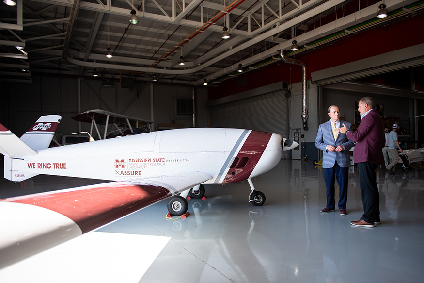 Mark Keenum and Tom Brooks are pictured talking in front of the Teros UAS